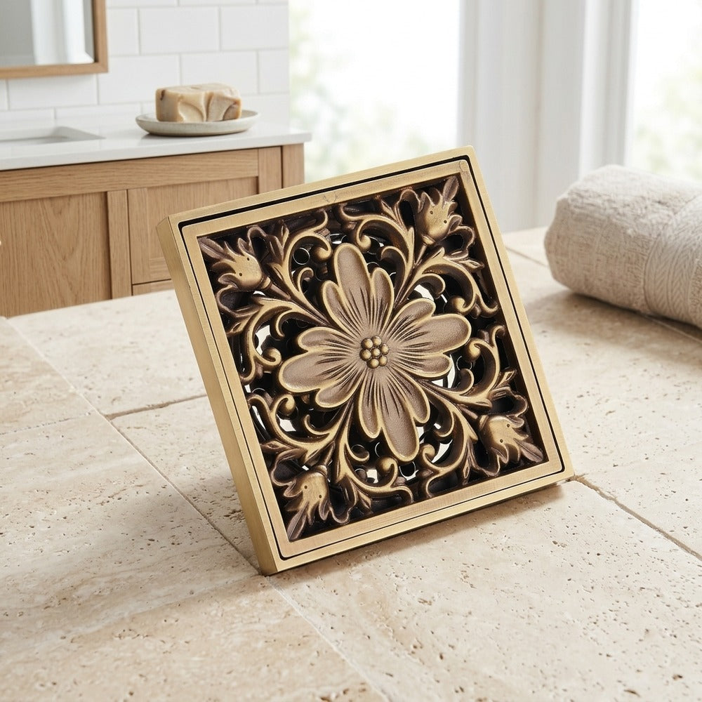 Lagomel square floor drain in antique brass, set in a Traditional/Classic bathroom