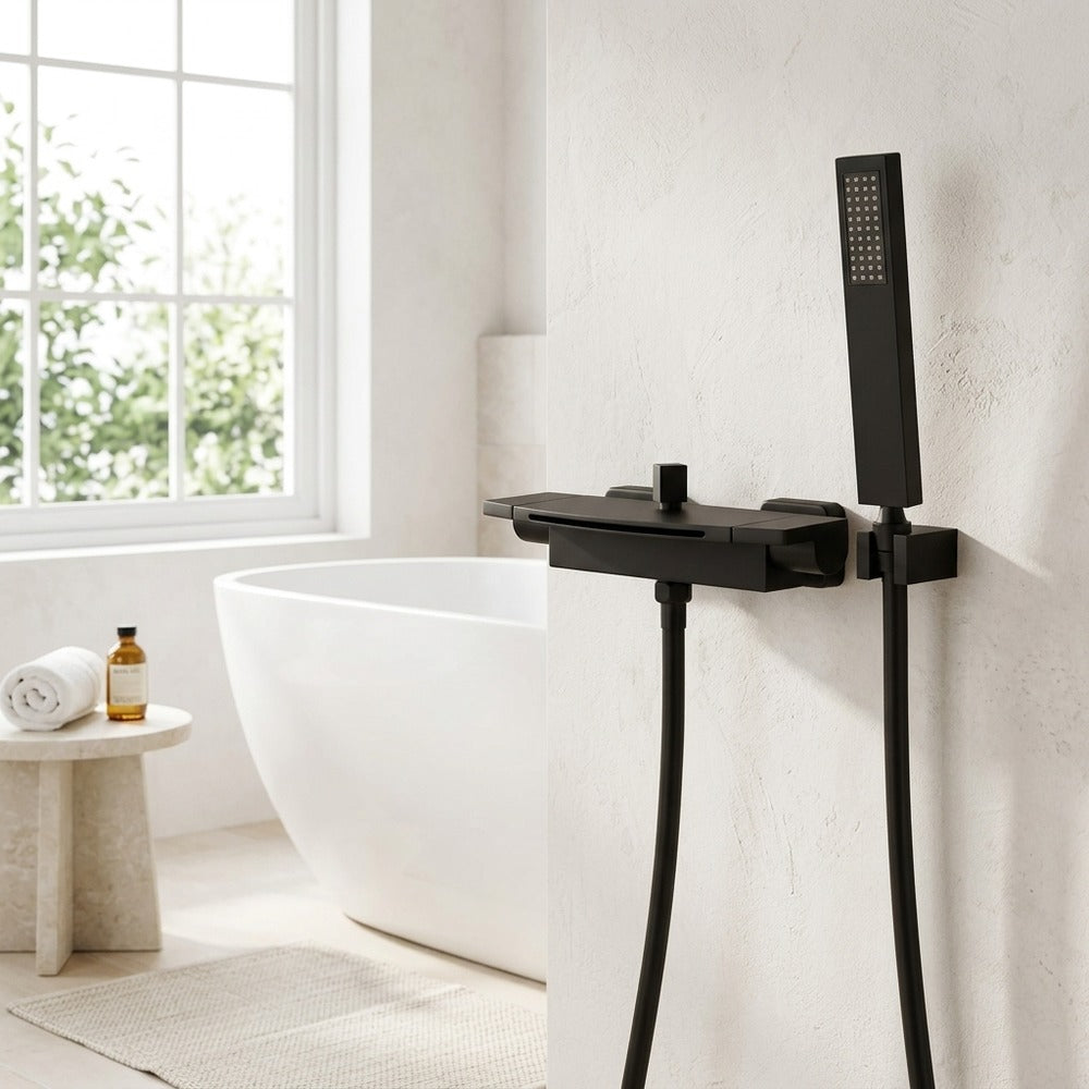 Lagomel waterfall wall-mount tub filler, set in a Modern/Contemporary bathroom