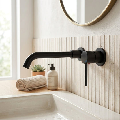 Lagomel single-handle wall-mount bathroom faucet, set in a Modern/Contemporary bathroom