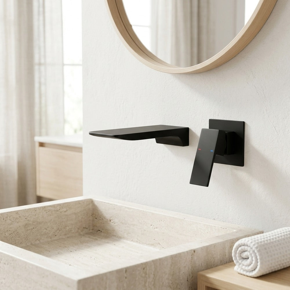 Lagomel waterfall single-handle wall-mount bathroom faucet in matte black, set in a Modern/Contemporary bathroom