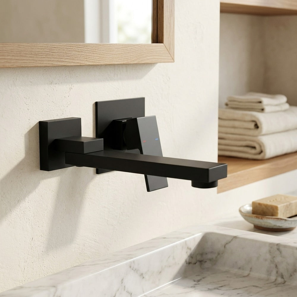 Lagomel single-handle wall-mount bathroom faucet in matte black, set in a Contemporary bathroom