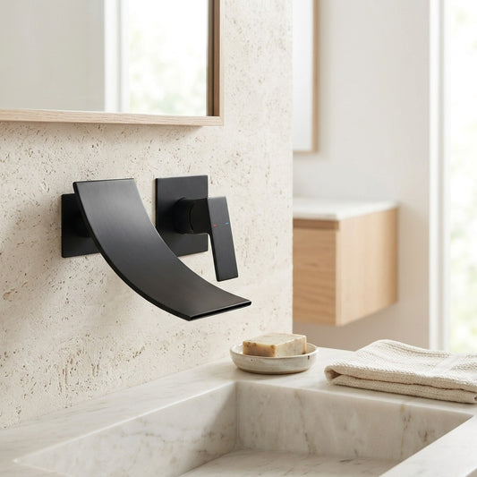 Lagomel waterfall single-handle wall-mount bathroom faucet in matte black, set in a Modern/Contemporary bathroom