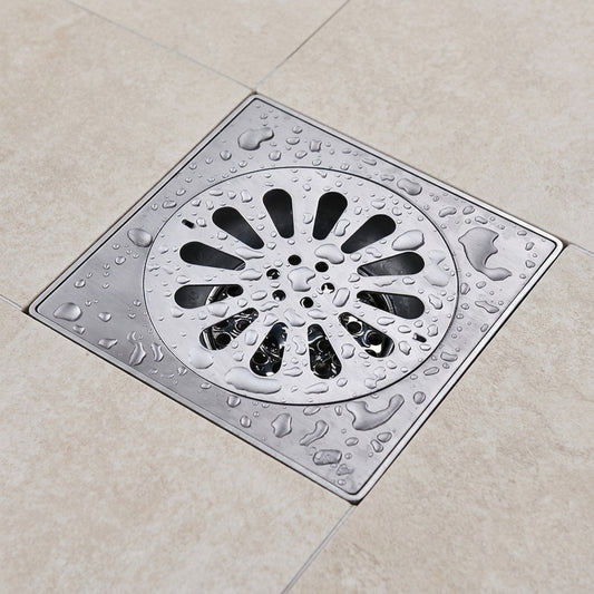 Lagomel square floor drain in stainless steel, set in a Modern/Contemporary bathroom