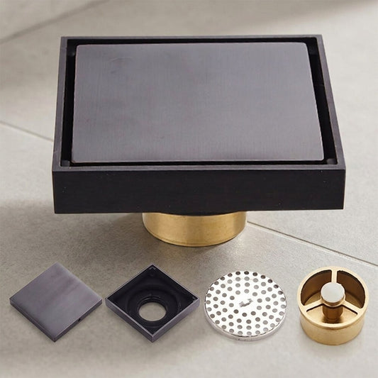 Lagomel square floor drain in oil-rubbed bronze, set in a Modern bathroom