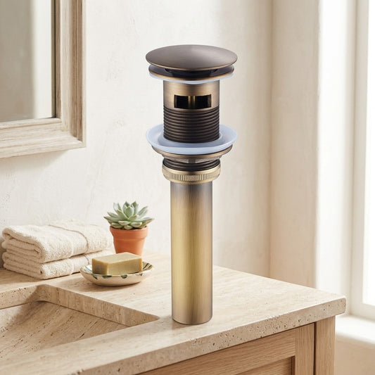 Lagomel bathroom sink drain in matte black, rose gold, brushed gold, chrome, matte white, oil-rubbed bronze,, set in a Contemporary bathroom