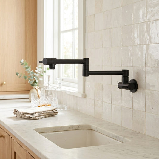 Lagomel wall-mounted pot filler in matte black, set in a Contemporary/Modern bathroom