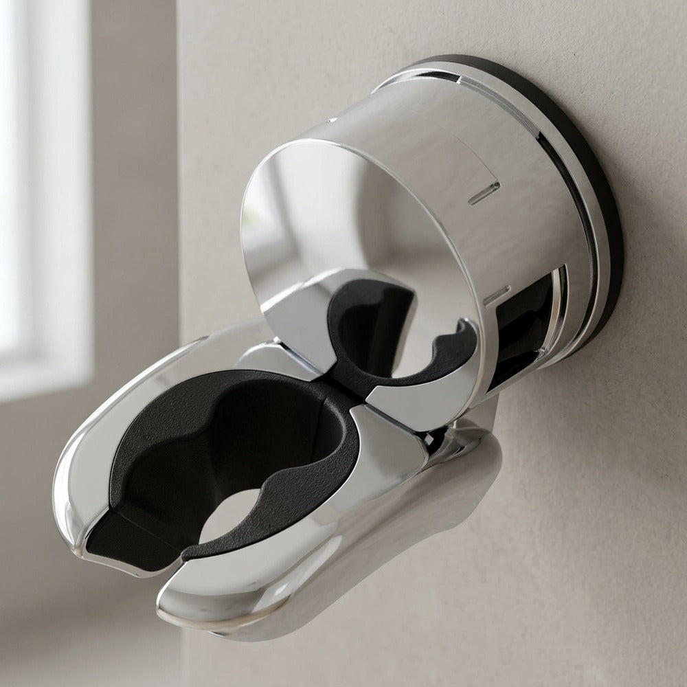 Lagomel wall-mounted shower head holder in chrome, set in a Contemporary bathroom