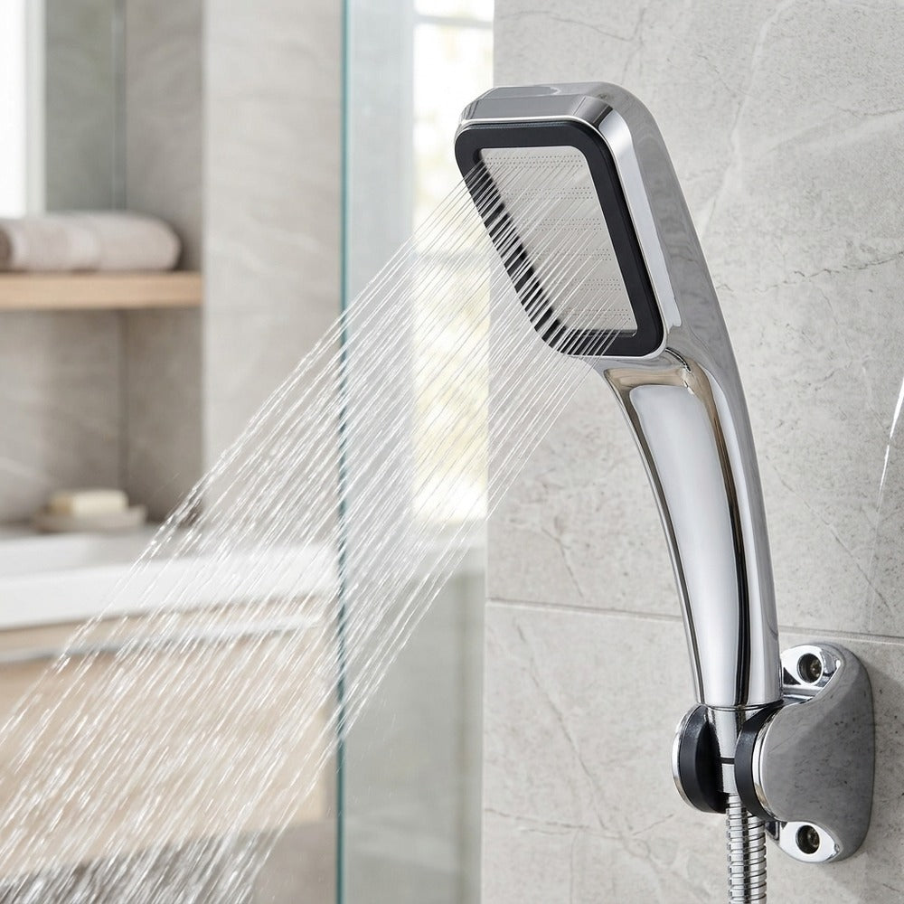 Lagomel hand shower in chrome, set in a Contemporary bathroom