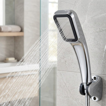 Lagomel hand shower in chrome, set in a Contemporary bathroom