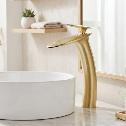 Lagomel single-hole waterfall vessel sink faucet in antique brass, brushed chrome, brushed gold, brushed nickel, chrome,, set in a Modern/Minimalist bathroom