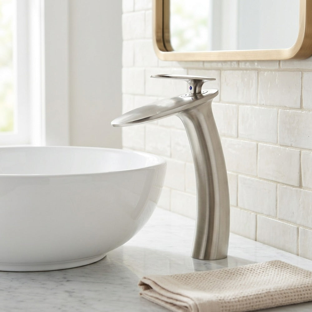 Lagomel single-hole waterfall vessel sink faucet, set in a Modern/Contemporary bathroom