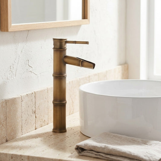 Lagomel waterfall single-handle vessel sink faucet in antique brass, brushed nickel, set in a Vintage/Retro/Contemporary bathroom