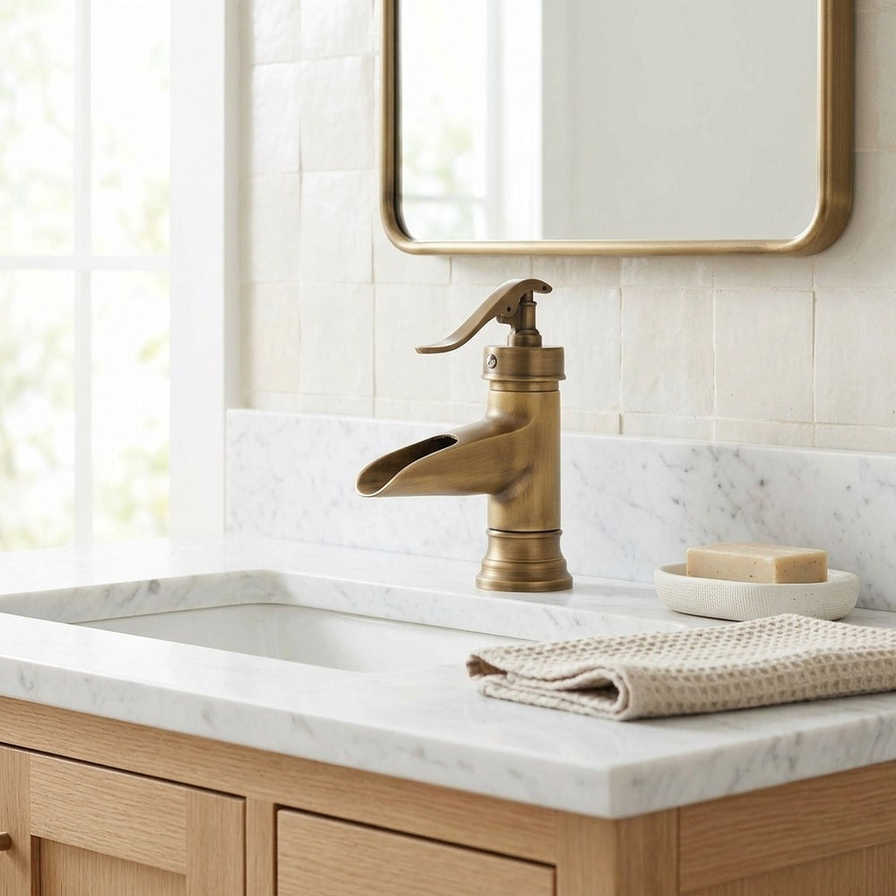 Lagomel waterfall single-hole bathroom faucet in antique brass, brushed nickel, two-tone / mixed finish, set in a Vintage/Retro/Traditional/Classic bathroom