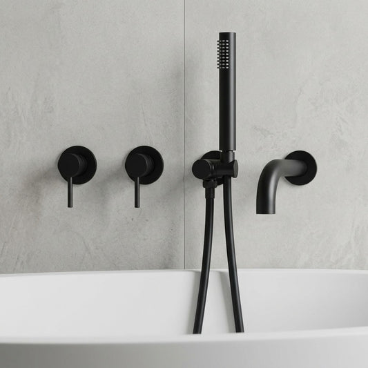 Lagomel wall-mount tub filler in matte black, set in a Modern/Contemporary bathroom