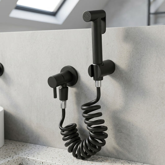 Lagomel wall-mounted single-handle bidet faucet in matte black, set in a Contemporary bathroom