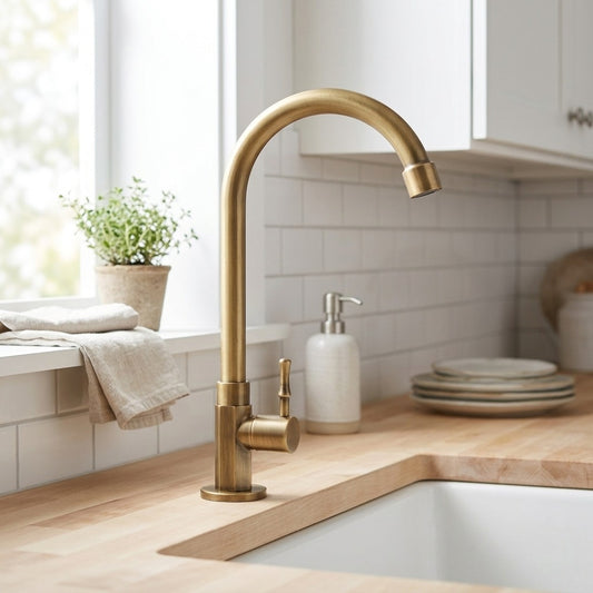 Lagomel single-handle kitchen faucet in antique brass, set in a Modern/Contemporary kitchen