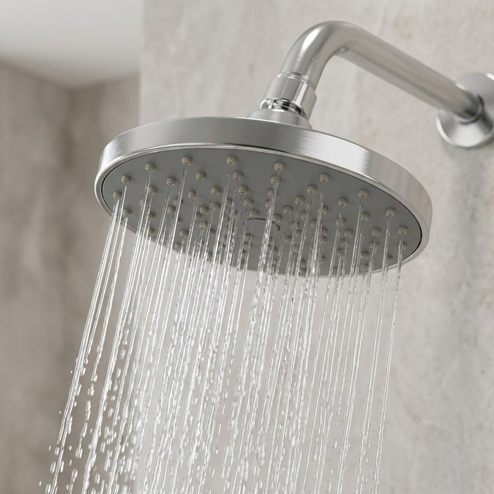 Lagomel wall-mounted rain shower head in chrome, set in a Contemporary/Modern bathroom