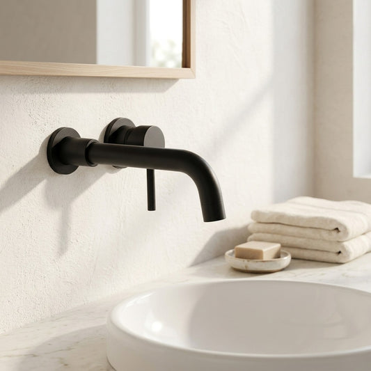 Lagomel single-handle wall-mount bathroom faucet in matte black, brushed nickel, antique brass, chrome, set in a Modern/Contemporary bathroom