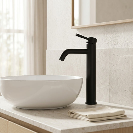Lagomel single-handle vessel sink faucet in matte black, set in a Modern/Minimalist bathroom
