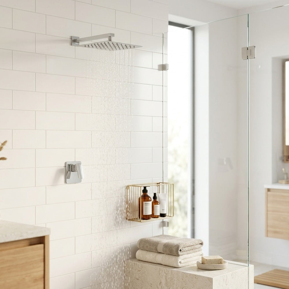 Lagomel wall-mounted single-handle complete shower system in chrome, set in a Modern/Contemporary bathroom