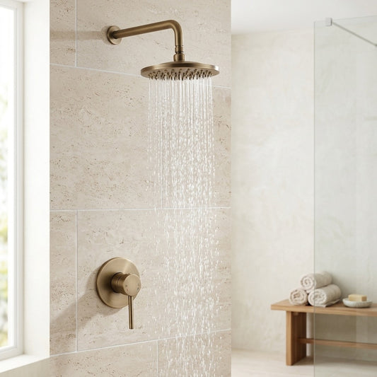 Lagomel wall-mounted single-handle complete shower system in antique brass, set in a Traditional/Classic bathroom