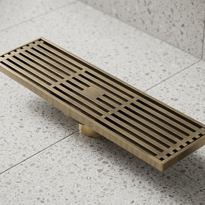 Lagomel linear floor drain in brushed bronze, set in a Traditional/Classic/Vintage/Retro bathroom