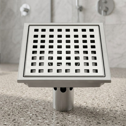 Lagomel square floor drain in stainless steel, set in a Modern/Contemporary bathroom