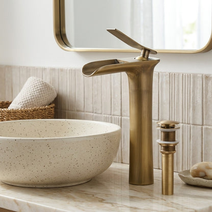 Lagomel single-hole waterfall vessel sink faucet, set in a Modern/Contemporary bathroom