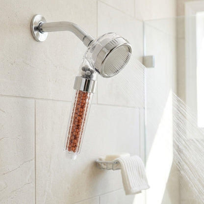 Lagomel hand shower in chrome, set in a Contemporary bathroom