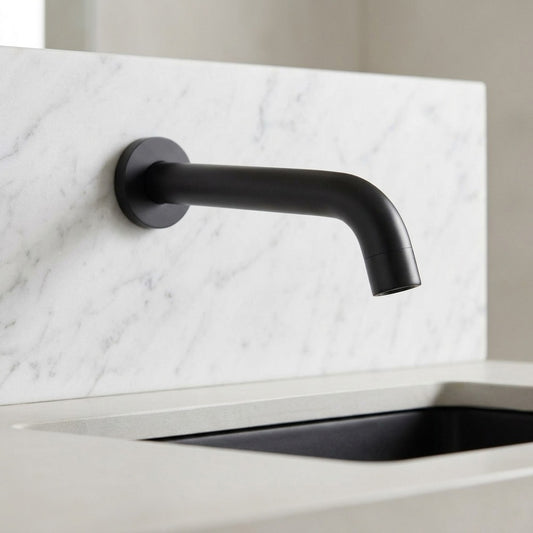 Lagomel wall-mounted tub spout in matte black, set in a Modern/Vintage/Retro bathroom