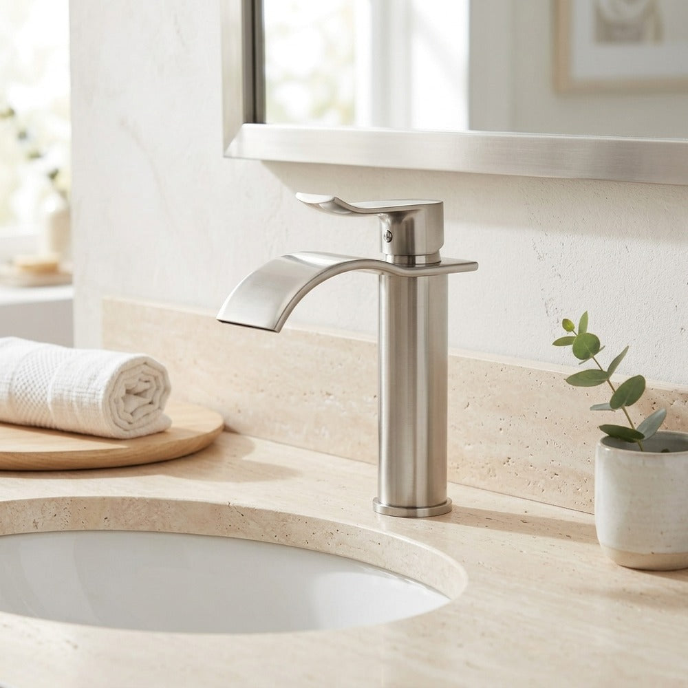 Lagomel waterfall single-hole bathroom faucet in brushed nickel, set in a Contemporary bathroom