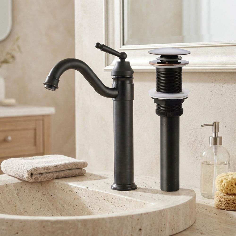 Lagomel single-hole vessel sink faucet and drain set in oil-rubbed bronze, set in a Traditional/Classic bathroom