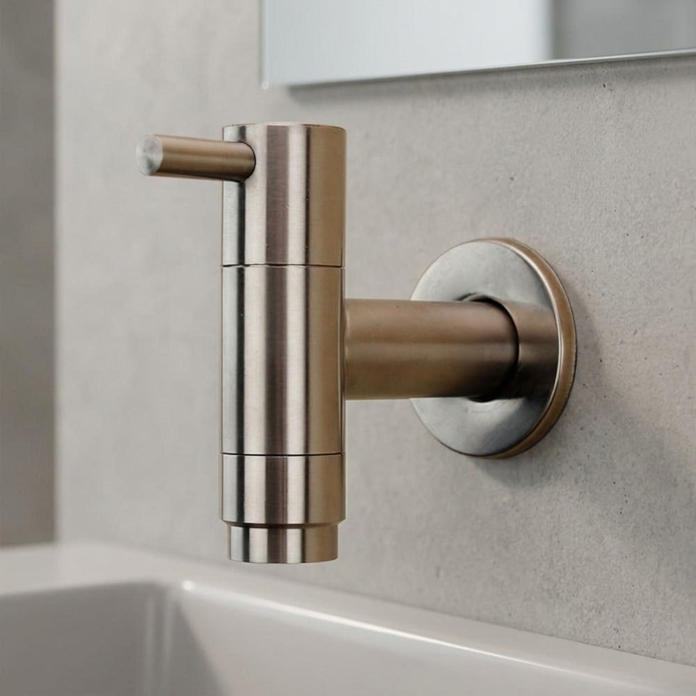 Lagomel single-handle wall-mount kitchen faucet in stainless steel, set in a Contemporary kitchen