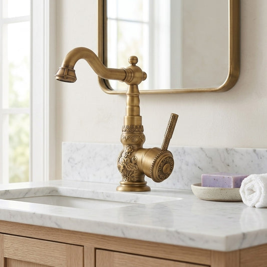 Lagomel single-hole bathroom faucet in antique brass, set in a Traditional/Classic/Vintage/Retro bathroom
