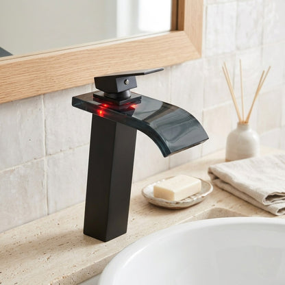 Lagomel single-hole waterfall vessel sink faucet, set in a Modern/Contemporary bathroom