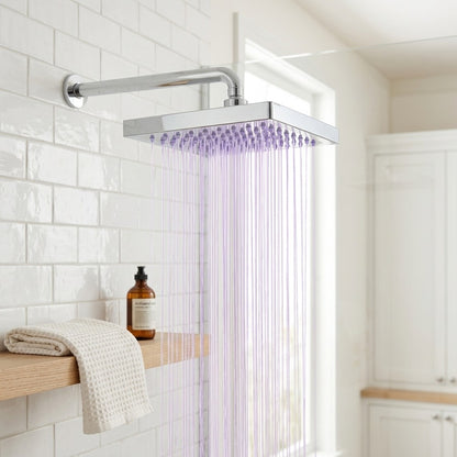 Lagomel rain shower head in chrome, set in a Contemporary bathroom