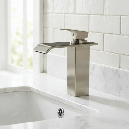 Lagomel waterfall single-hole bathroom faucet in brushed nickel, set in a Contemporary bathroom