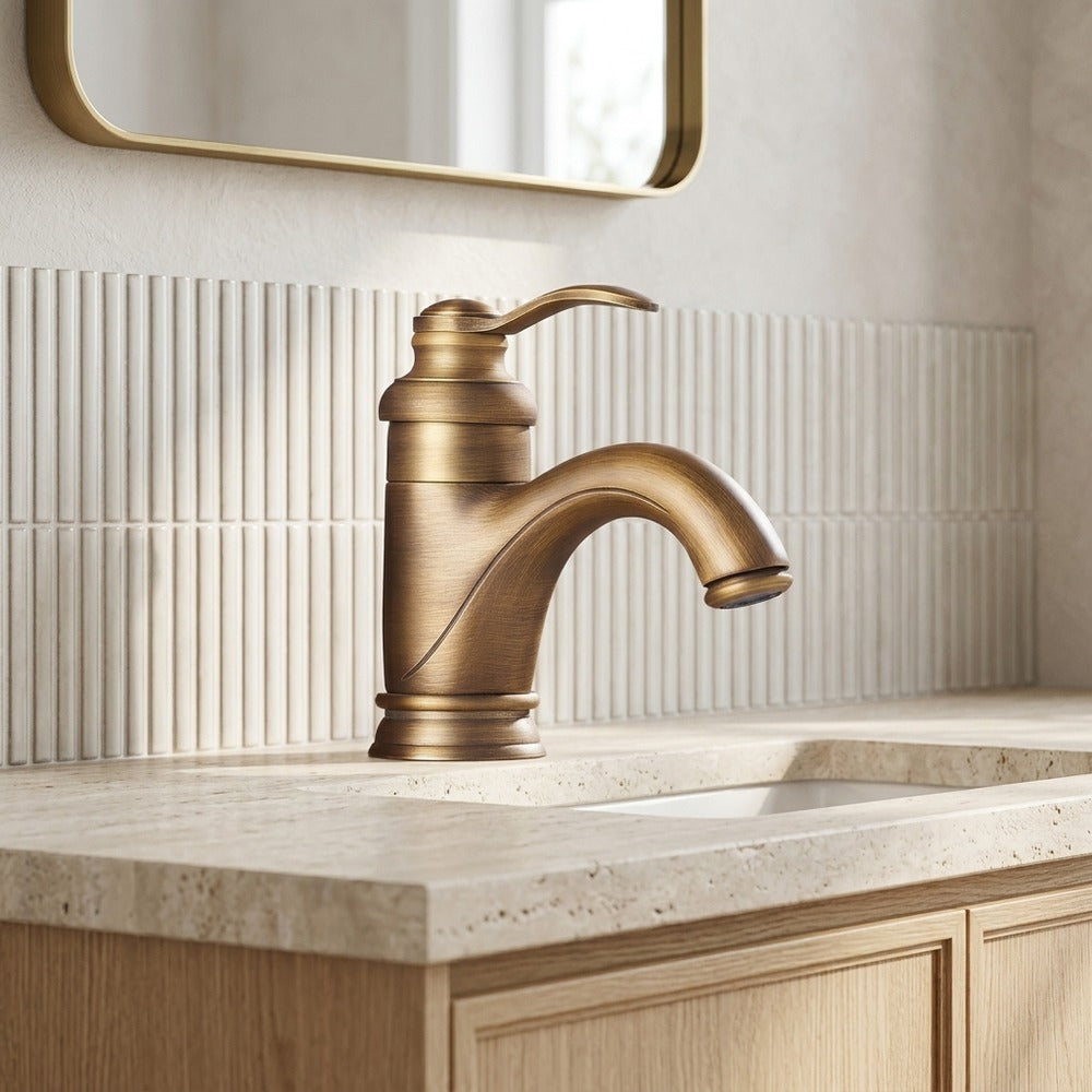 Lagomel single-hole bathroom faucet in antique brass, oil-rubbed bronze, polished gold, set in a Traditional/Classic bathroom