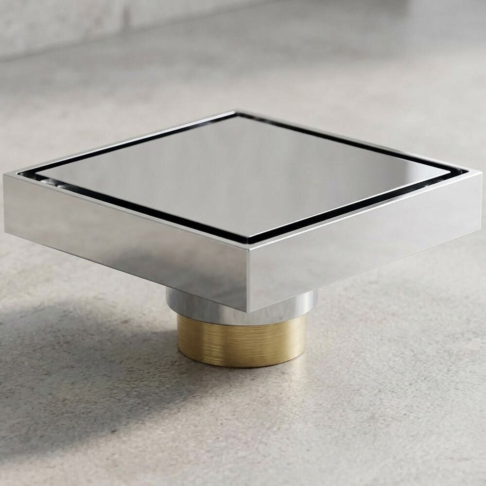 Lagomel square floor drain in brushed gold, chrome, matte black, set in a Contemporary bathroom