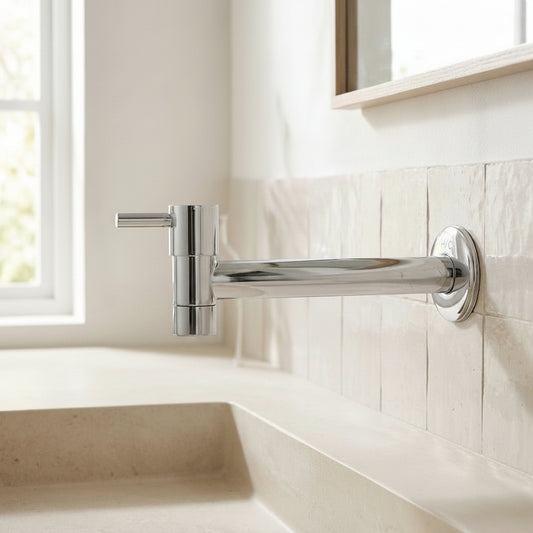 Lagomel single-handle wall-mount bathroom faucet in chrome, set in a Modern/Contemporary bathroom