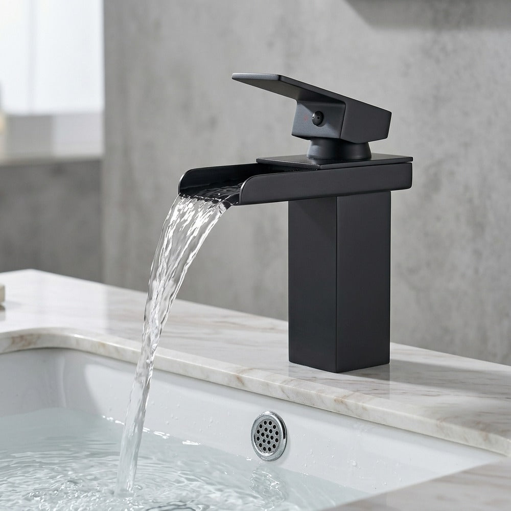 Lagomel waterfall single-hole bathroom faucet, set in a Modern/Minimalist bathroom