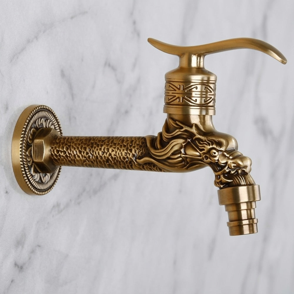 Lagomel wall-mounted single-handle outdoor faucet in antique brass, set in a Vintage/Retro/Traditional/Classic bathroom