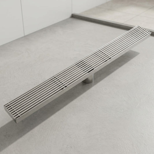 Lagomel linear floor drain in stainless steel, set in a Modern bathroom