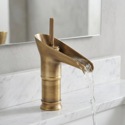 Lagomel waterfall single-hole bathroom faucet in antique brass, oil-rubbed bronze, polished gold, set in a Traditional/Classic/Modern bathroom
