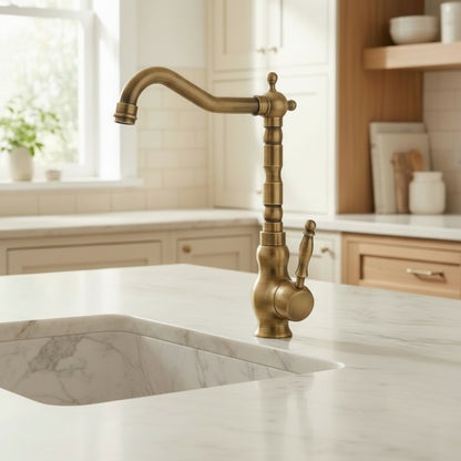 Lagomel single-handle kitchen faucet in antique brass, set in a Modern/Contemporary kitchen