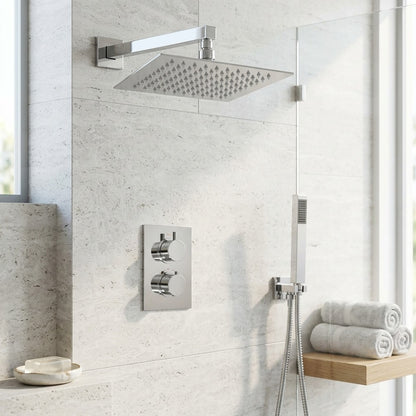 Lagomel wall-mounted complete shower system in chrome, set in a Contemporary bathroom