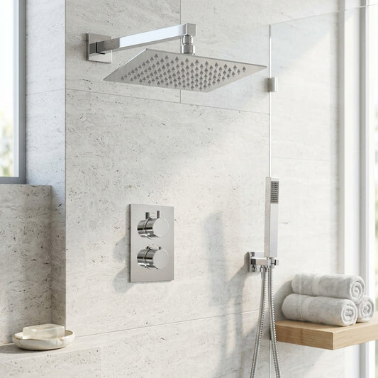Lagomel wall-mounted complete shower system in chrome, set in a Contemporary bathroom