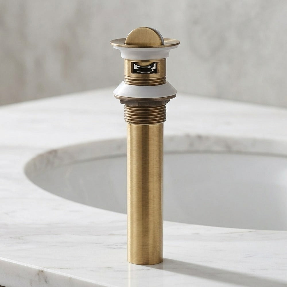 Lagomel bathroom sink drain in antique brass, matte black, polished gold, set in a Traditional/Classic/Modern bathroom