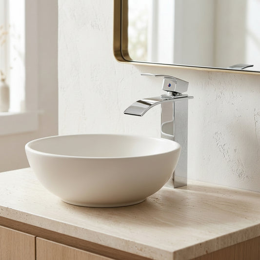 Lagomel single-hole waterfall vessel sink faucet in chrome, set in a Contemporary bathroom