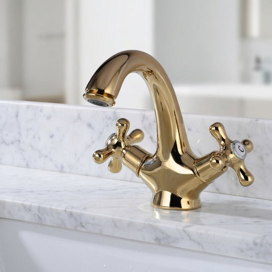Lagomel single-hole bathroom faucet in polished gold, set in a Traditional/Classic/Vintage/Retro bathroom